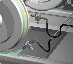 Wheel flange lubrication systems